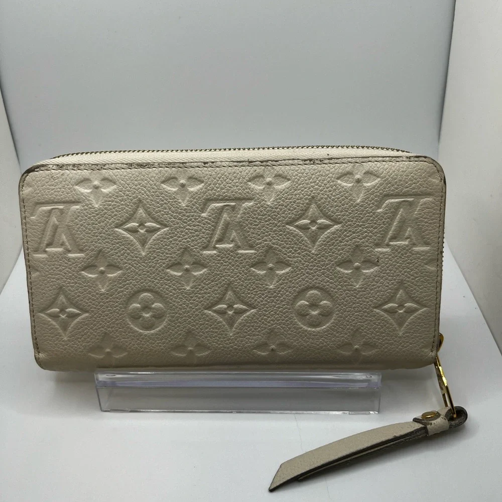 GUC Louis Vuitton Monogram Cream Empreinte Zippy Wallet - Picture 2 of 11